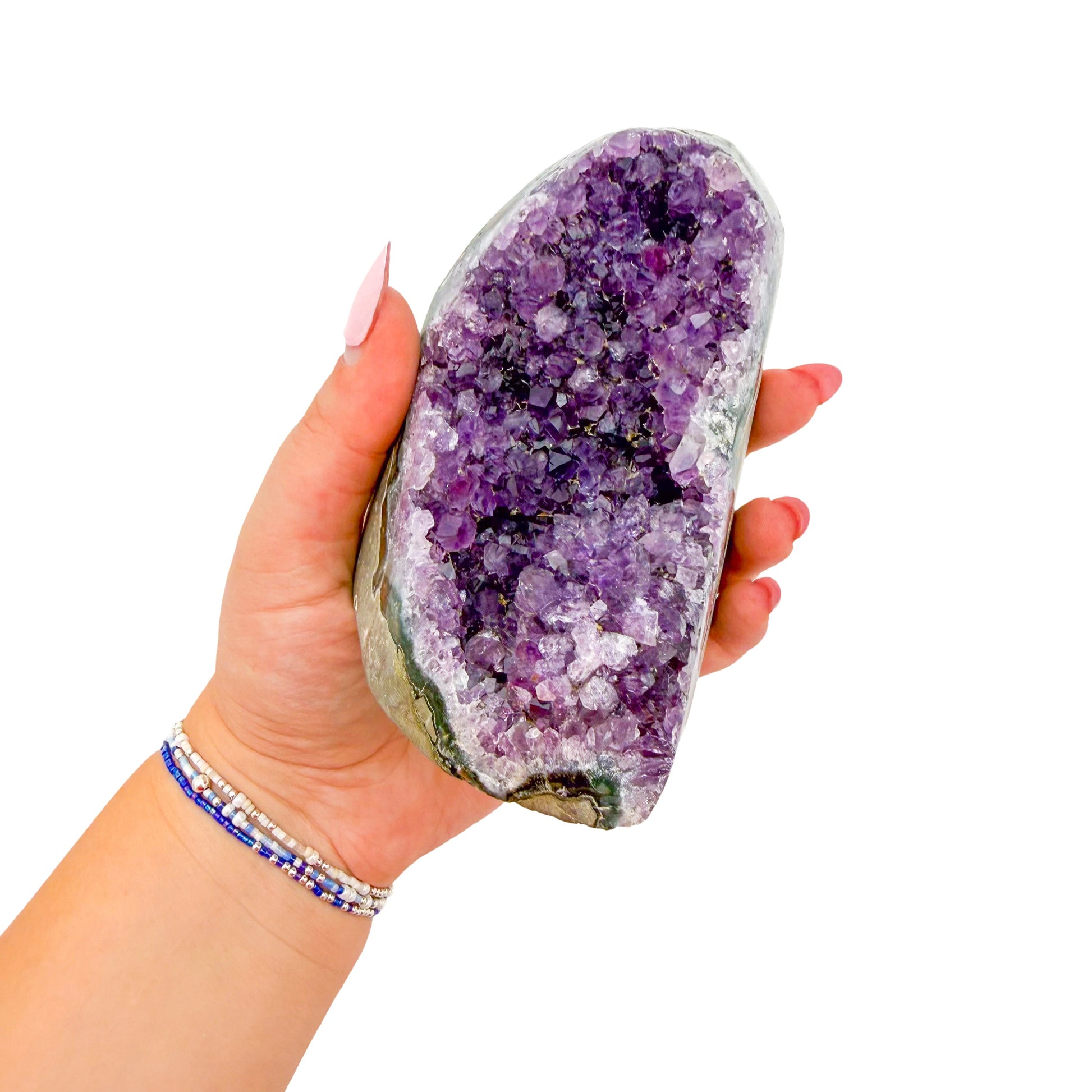 Polished amethyst geode no. 117 photographed at the cut base, measuring 3.83 by 2.80 by 3.94 inches, Uruguayan AA grade.
