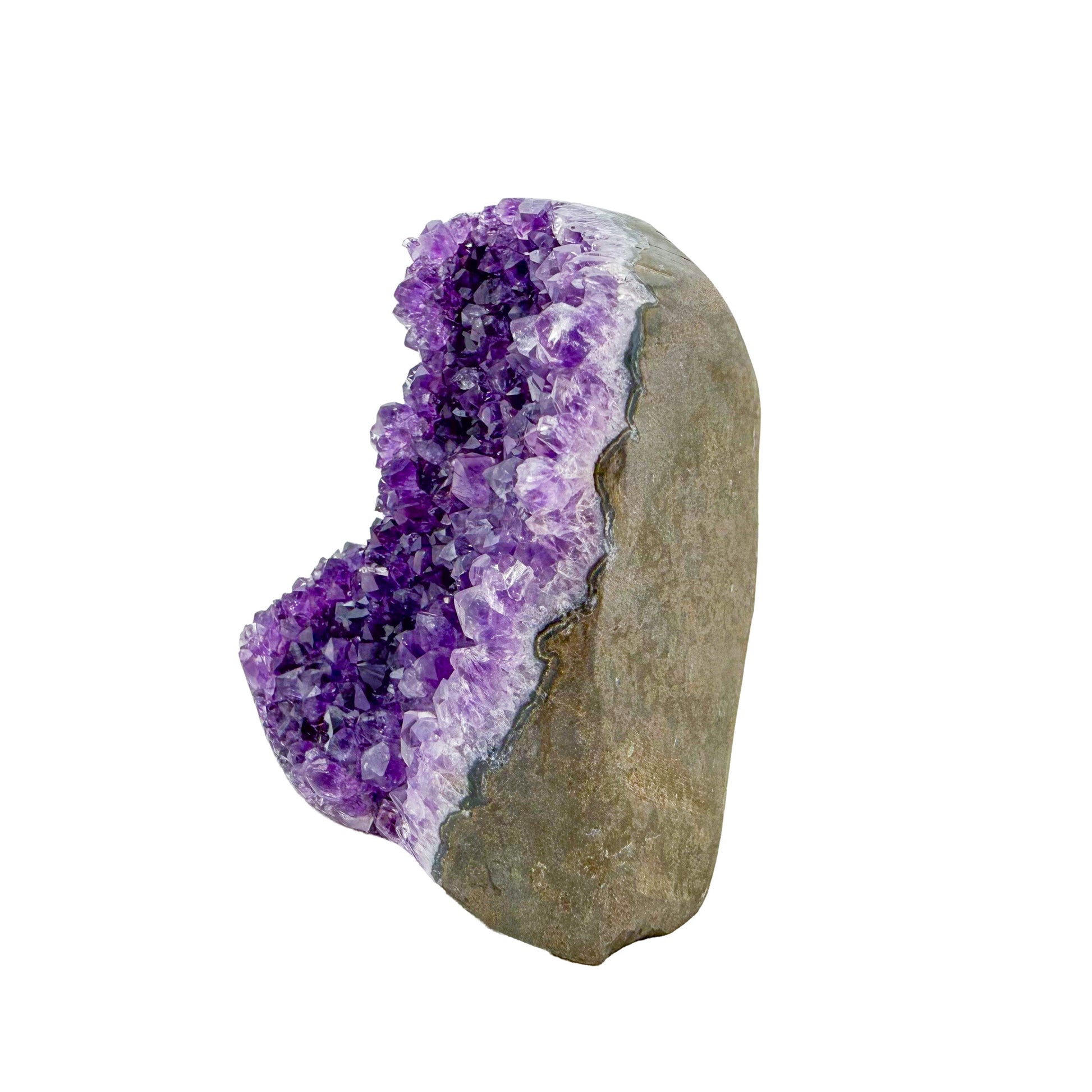 Uruguayan amethyst geode no. 119 at the angled three-quarter view, violet crystal interior framed by its polished agate shell, 1.23 lb.