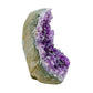 Right profile of a 1.23 pound amethyst geode, no. 119, deep purple crystal lining a polished grey agate rind.