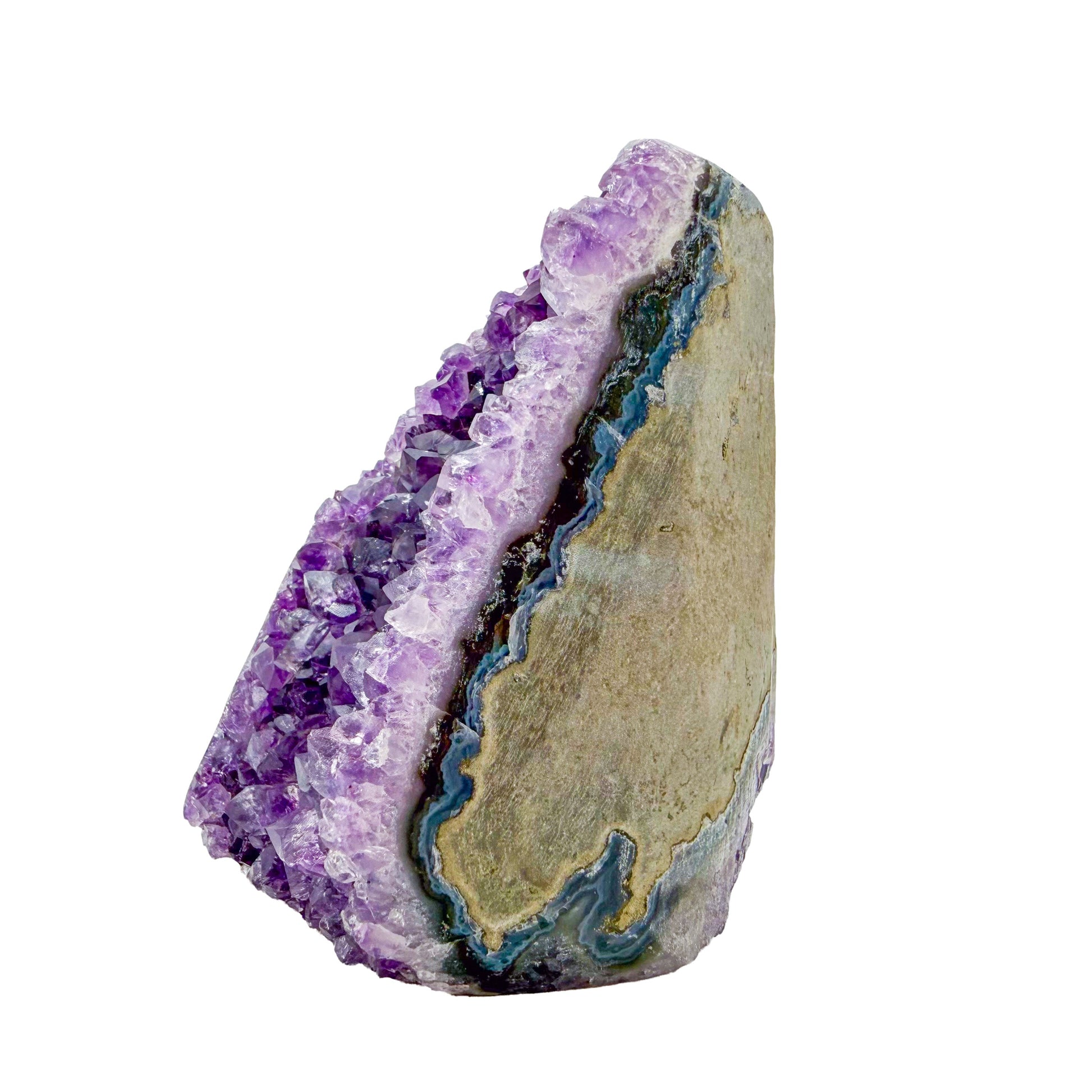 Angled three-quarter view of a 1.55 pound amethyst geode, no. 121, deep purple crystal lining a polished grey agate rind.