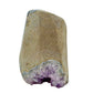 Polished amethyst geode no. 121 photographed at the left profile, measuring 3.01 by 2.94 by 4.02 inches, Uruguayan AA grade.
