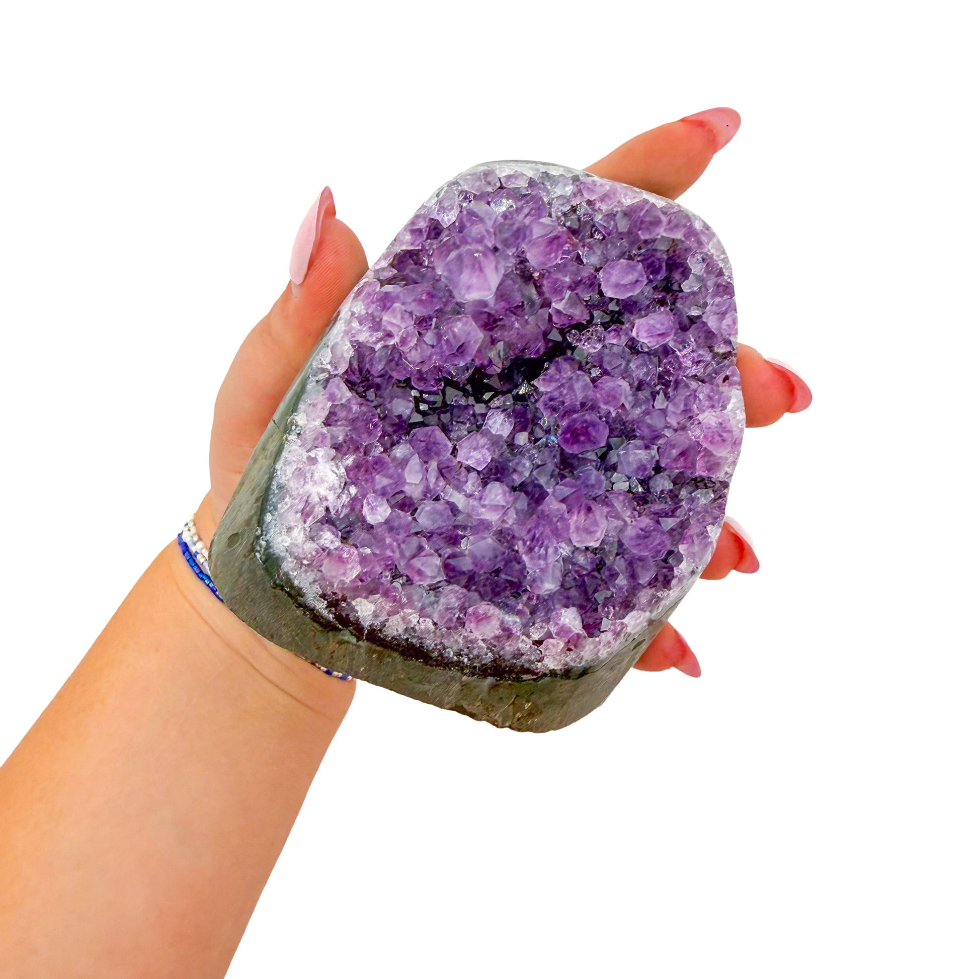 AA-grade amethyst polished geode no. 122 from Artigas, Uruguay, cut base, violet druzy interior on a cut base, 3.28 inches tall.