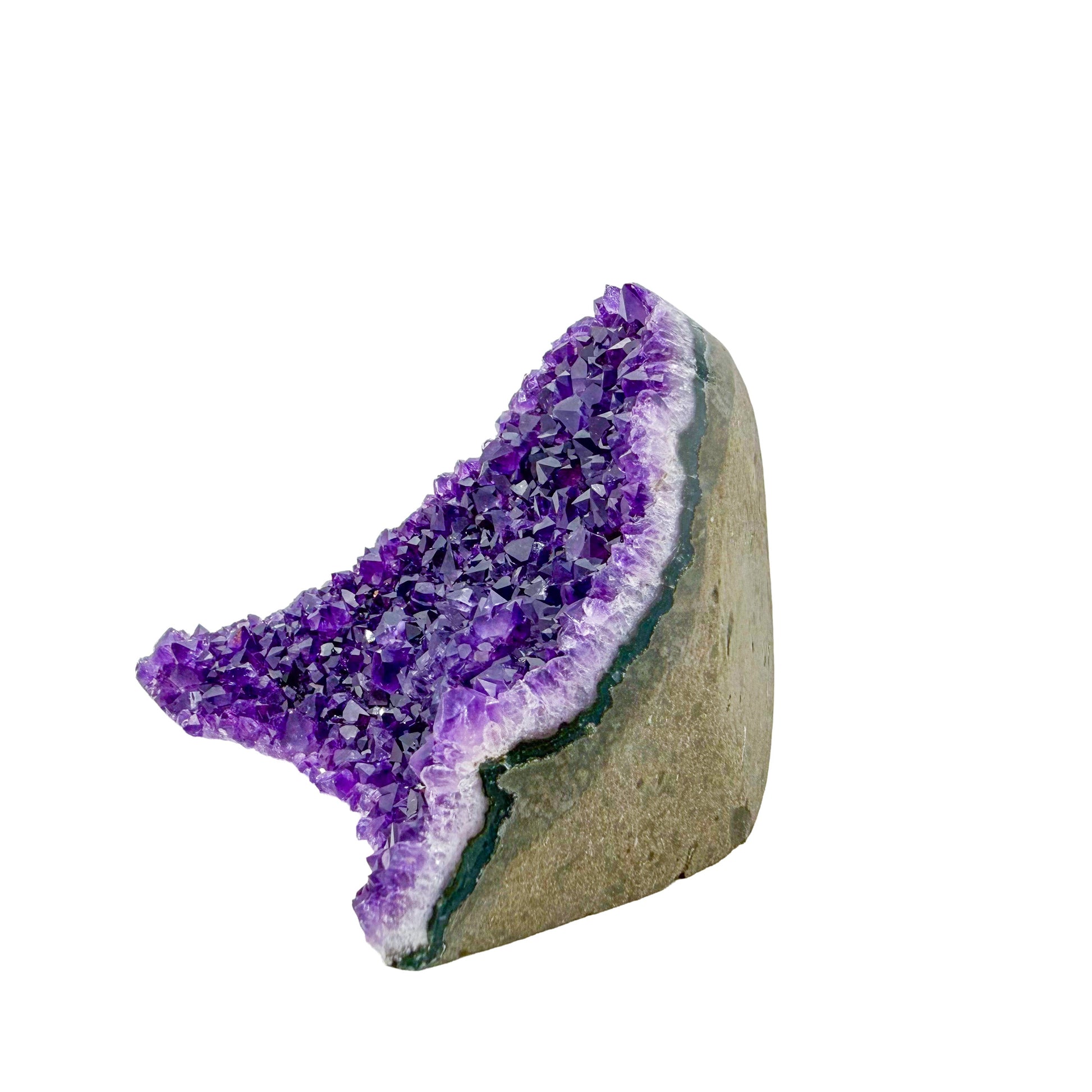 The angled three-quarter view of amethyst geode no. 123, 2.92 inches of violet druzy standing on a flat cut base.