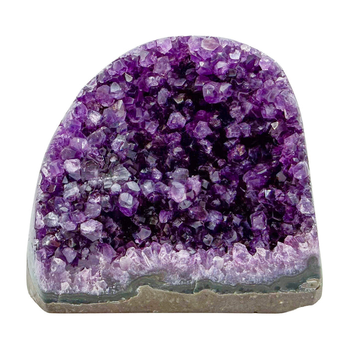 The primary crystal face of amethyst geode no. 124, 3.57 inches of violet druzy standing on a flat cut base.