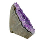AA-grade amethyst polished geode no. 125 from Artigas, Uruguay, right profile, violet druzy interior on a cut base, 3.68 inches tall.