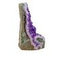 Right profile of a 2.84 pound amethyst geode, no. 126, deep purple crystal lining a polished grey agate rind.