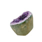 AA-grade amethyst polished geode no. 127 from Artigas, Uruguay, angled three-quarter view, violet druzy interior on a cut base, 3.03 inches tall.