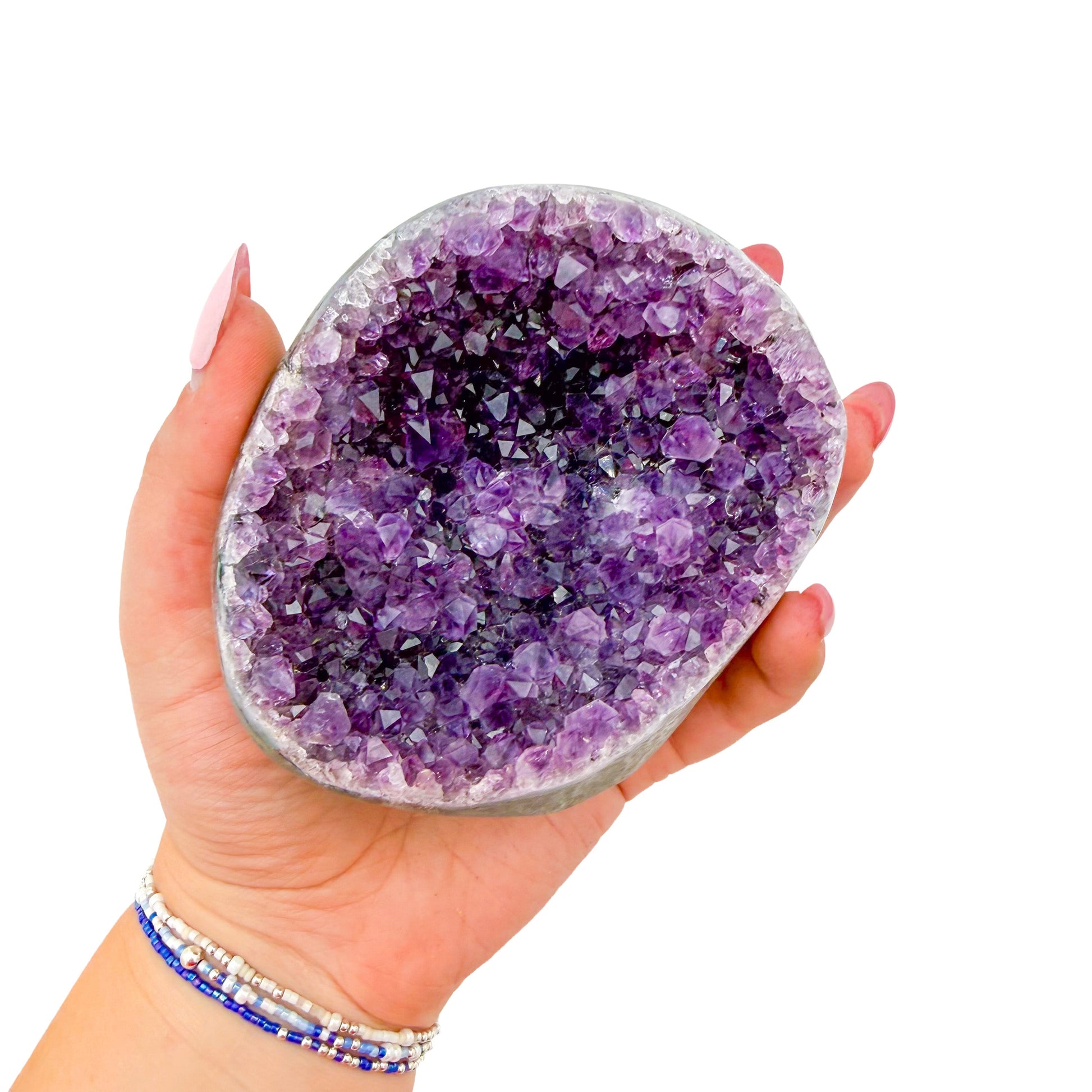 Cut base of AA amethyst geode no. 127, 3.47 inches across the polished face, natural and untreated.