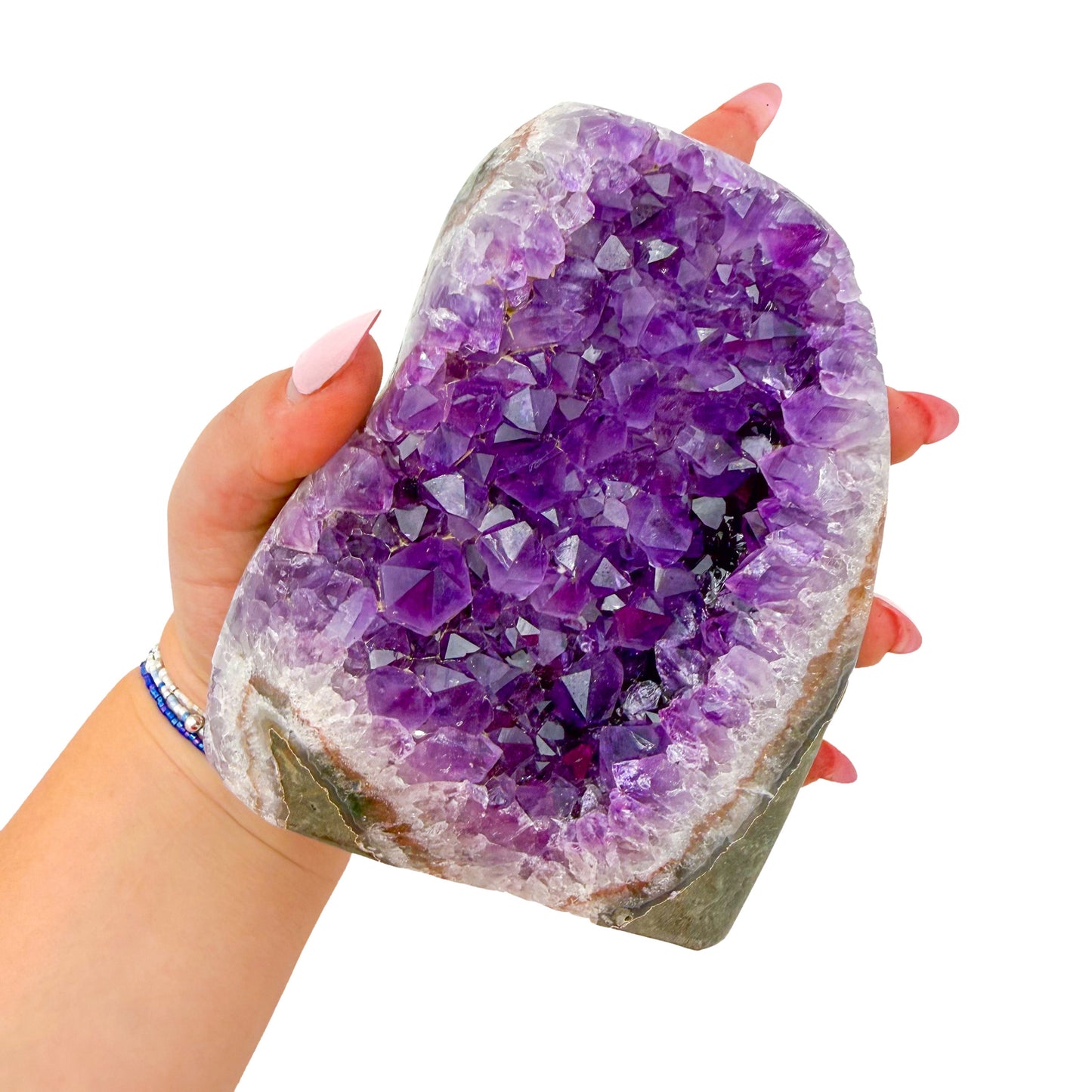 AA-grade amethyst polished geode no. 129 from Artigas, Uruguay, cut base, violet druzy interior on a cut base, 4.64 inches tall.