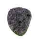 AA grade amethyst geode from Uruguay, detail of the crystal face, a green celadonite band above a tan agate rind, specimen 10.