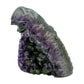 AAA grade amethyst geode from Uruguay, left profile, a grey-green shell with an olive mineral seam on one face, specimen 15.