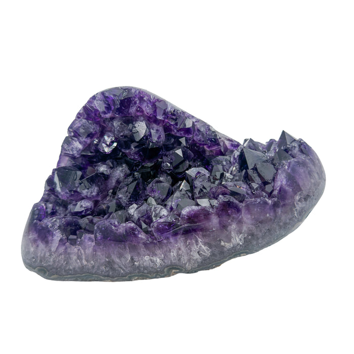 AAA grade amethyst polished geode from Artigas, Uruguay, chunky wedge, large deep purple crystal points, 7.53 x 4.87 x 4.01 in, 4.55 pounds.