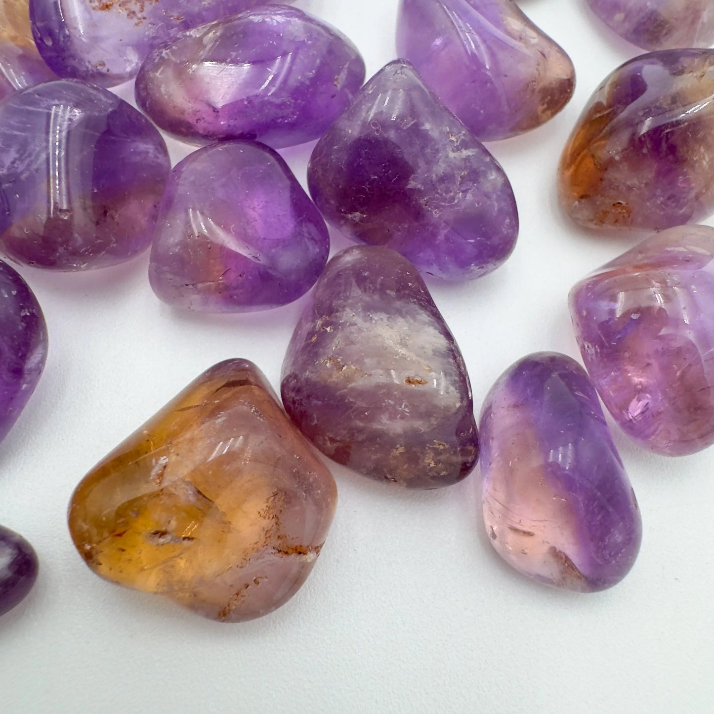 Underside detail of Ametrine tumbled stone, Bolivia-sourced.