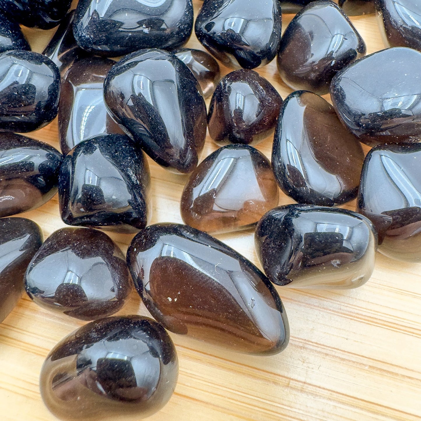 Overhead angle of Apache Tear tumbled stone, showing characteristic finish, often paired with practices around Grounding.