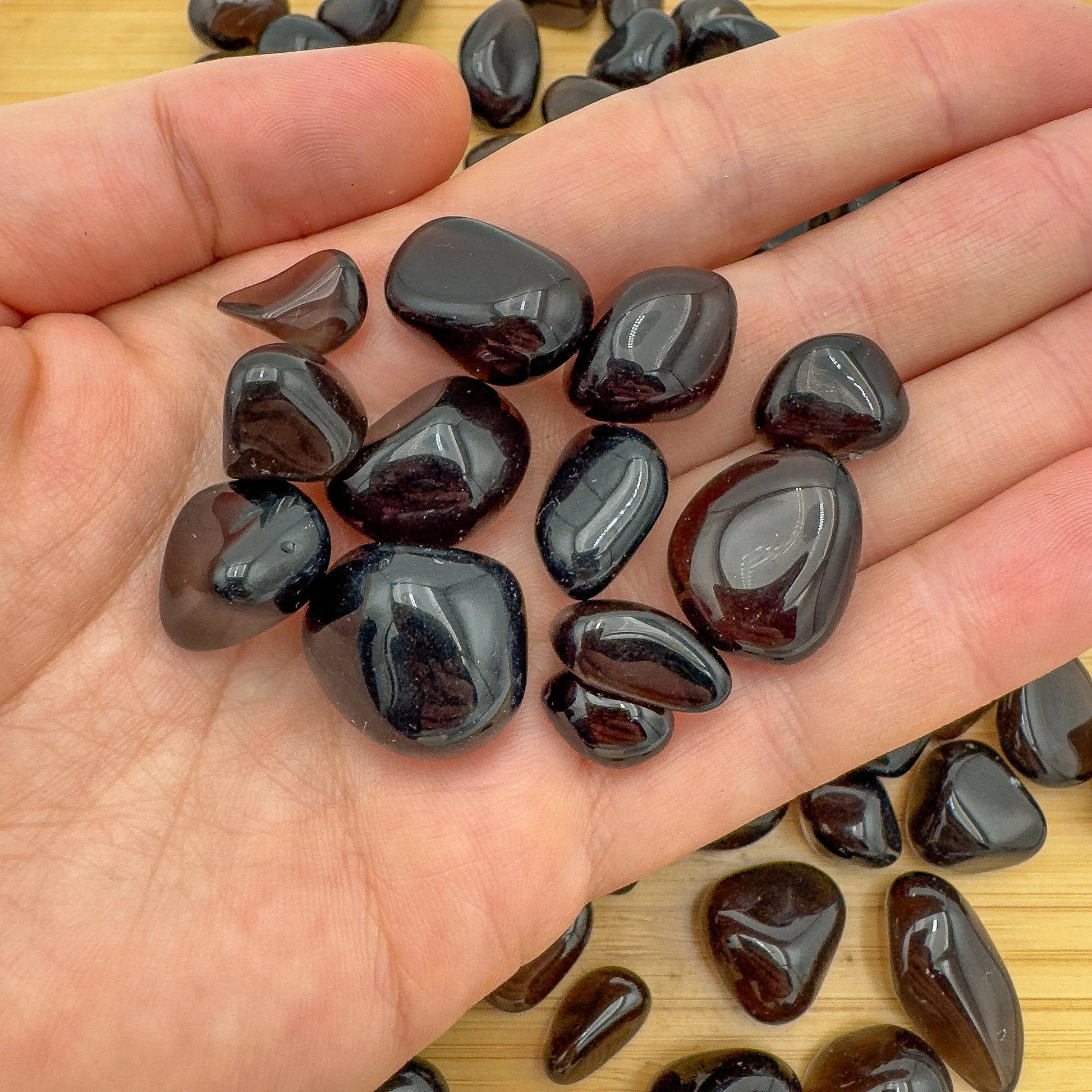 Scale reference of a Apache Tear tumbled stone kept close for Grounding and Protection.