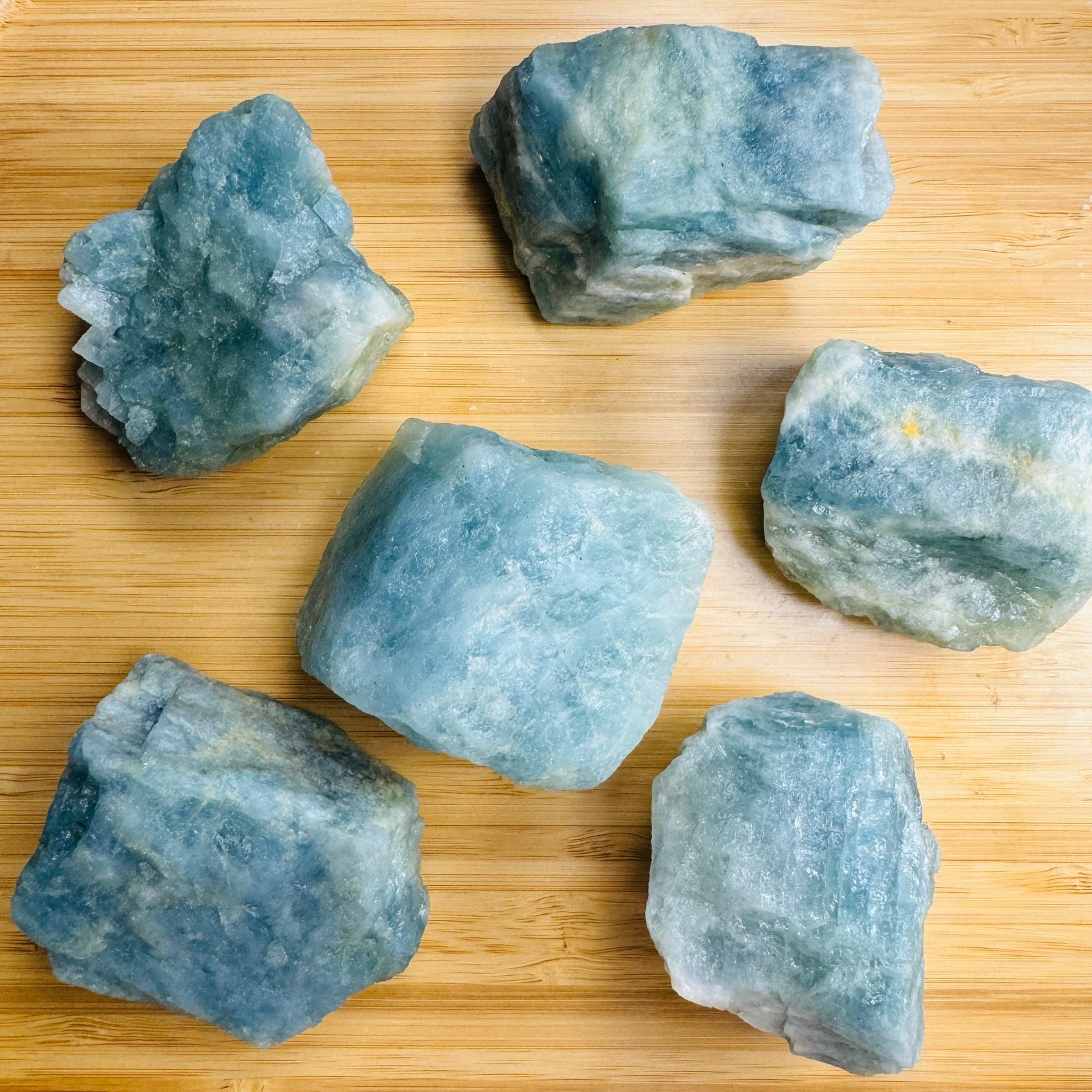 Up-close view of Aquamarine raw stone, for Stress Relief.