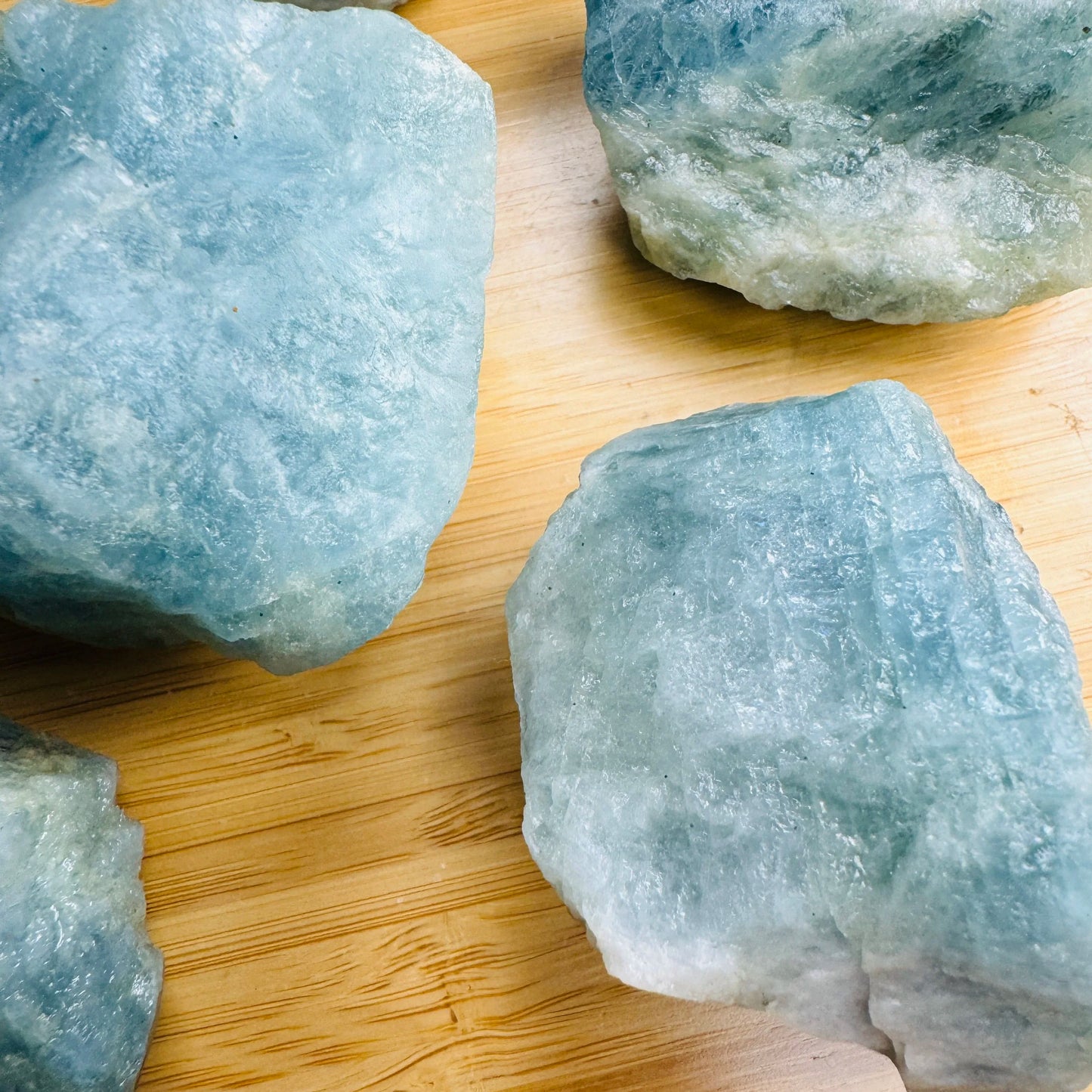 Plan view of Aquamarine raw stone, Brazil-sourced, traditionally used for Stress Relief.