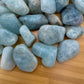 Grain detail of Aquamarine tumbled stone, kept close for Stress Relief, from Brazil.