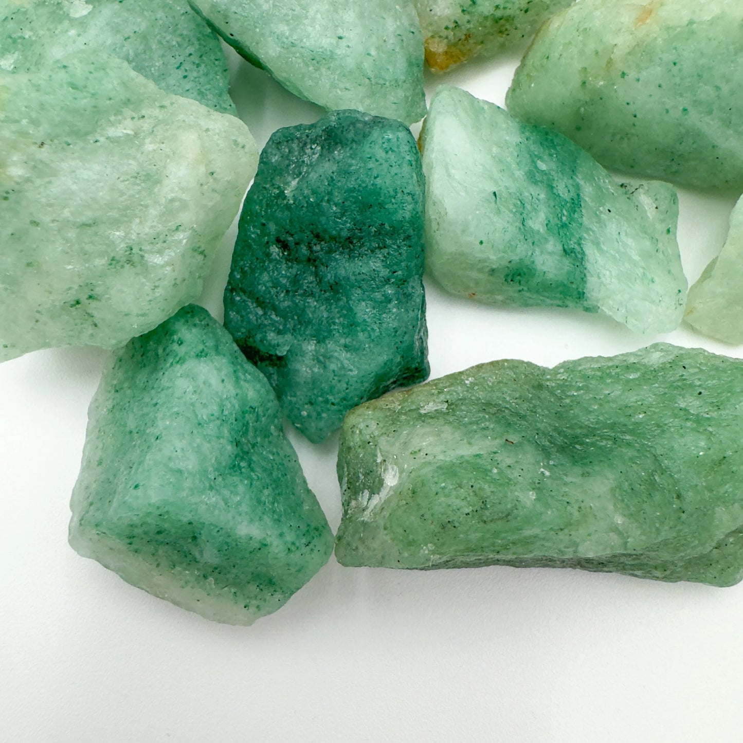 Lateral view of Grade A Aventurine raw stone, hand-selected from Masvingo, Zimbabwe, carried for Luck.