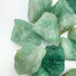 Looking down on Aventurine raw stone, to support Luck and Abundance, showing natural sheen.
