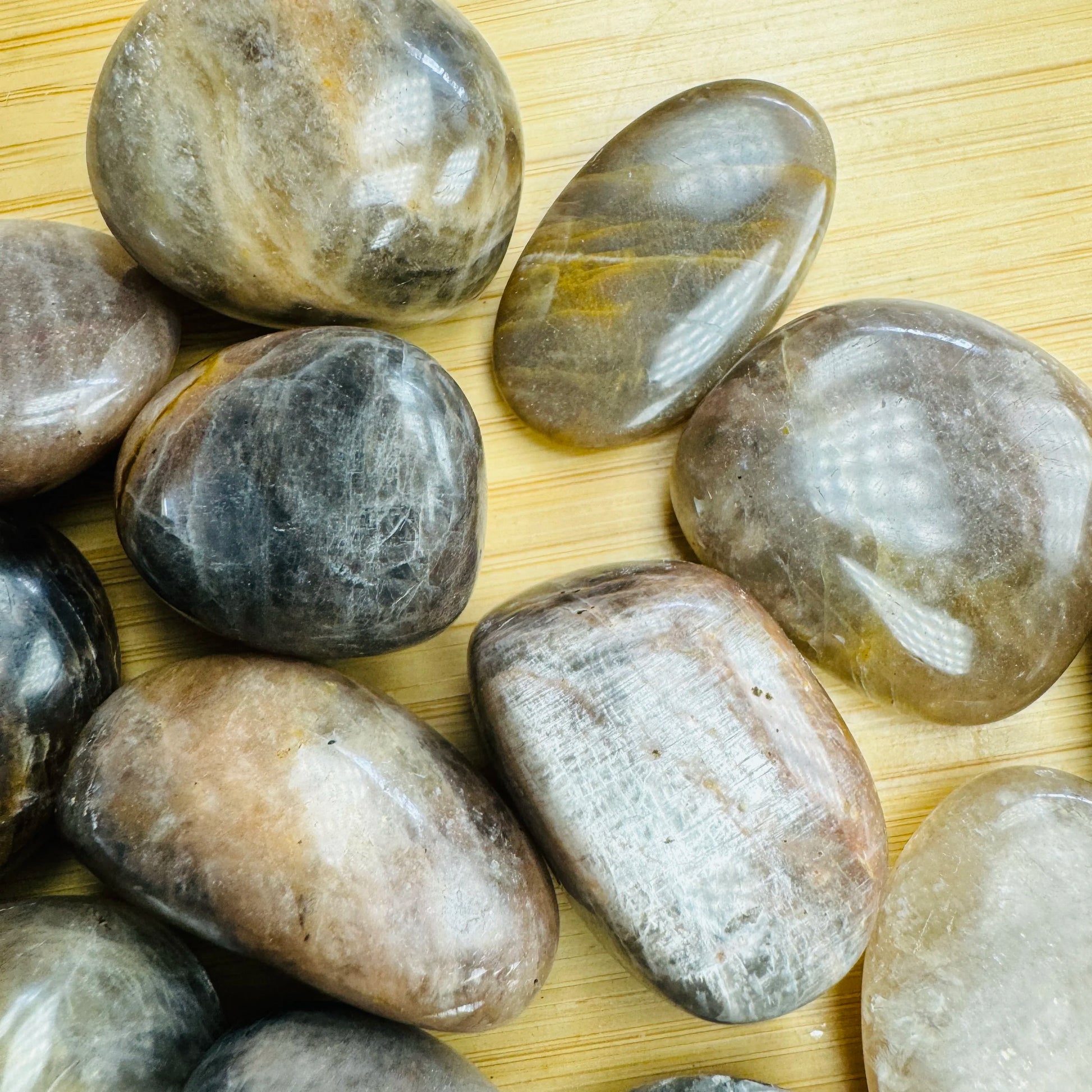 Reverse side of Black Moonstone tumbled stone, hand-selected from Amoron'i Mania, Madagascar.
