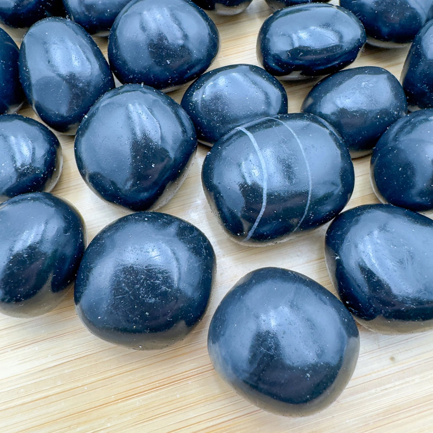 Full profile of Grade AA Black Onyx tumbled stone ready to ship from Beyond Bohemian