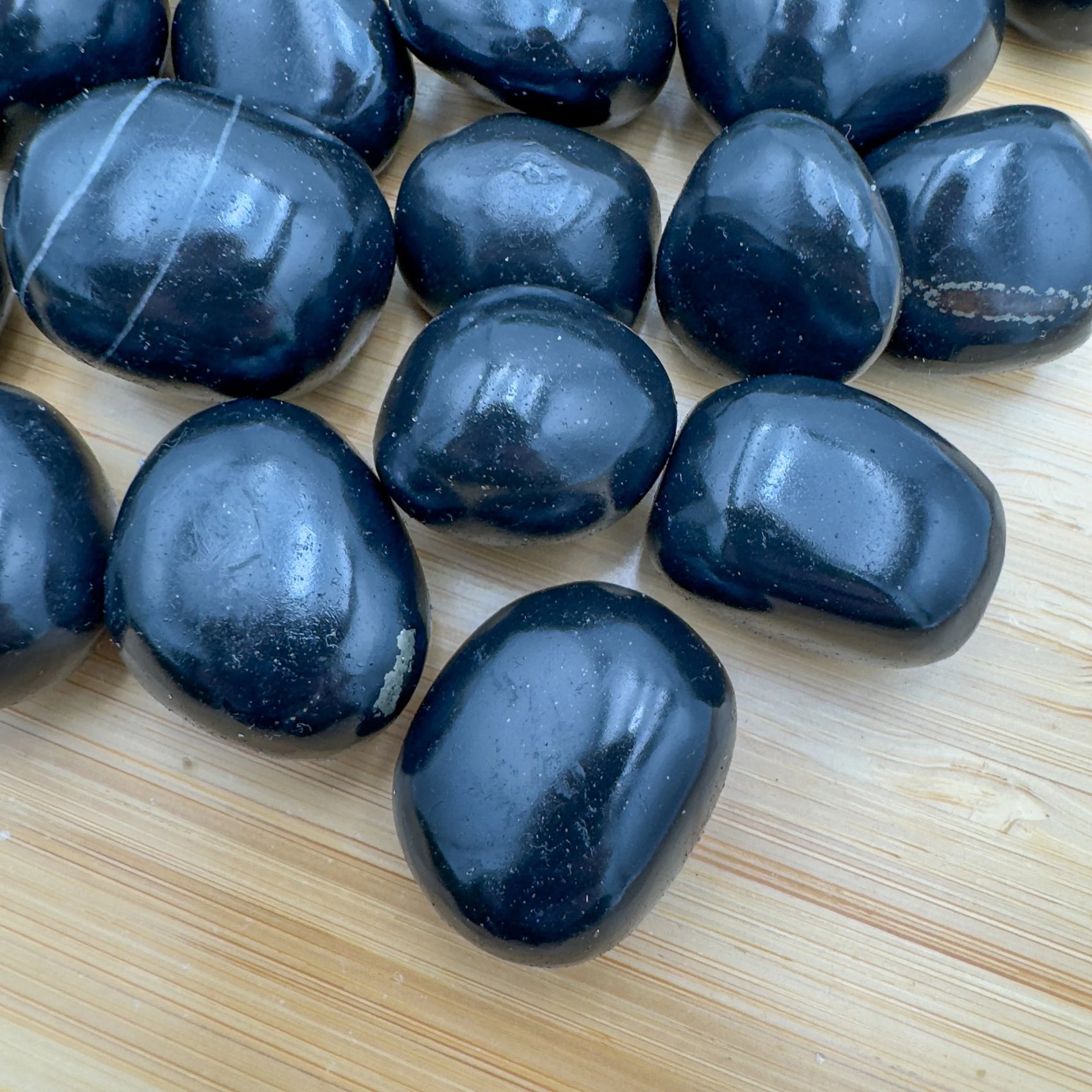 Full profile of Grade AA Black Onyx tumbled stone ready to ship from Beyond Bohemian