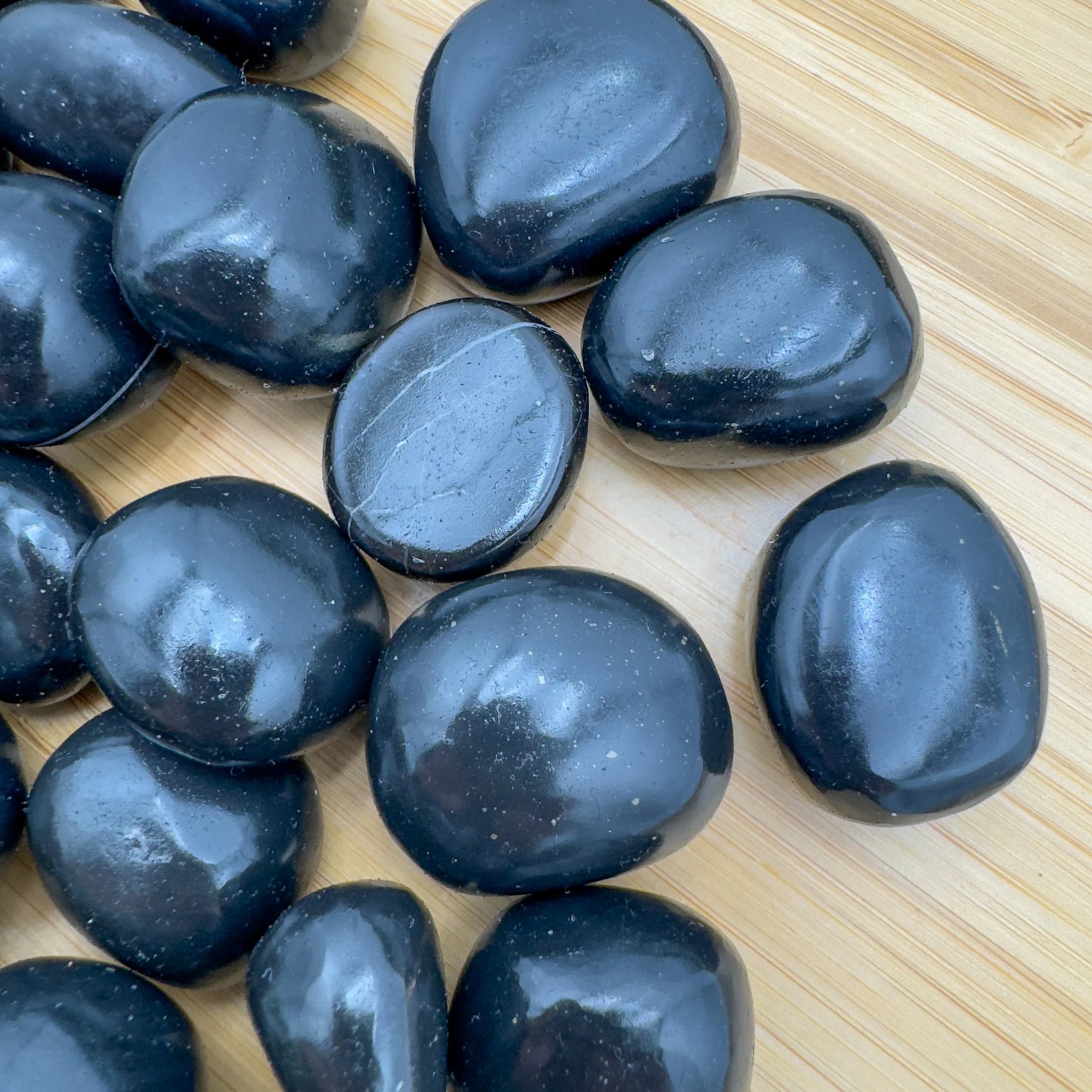 Full profile of Grade AA Black Onyx tumbled stone ready to ship from Beyond Bohemian