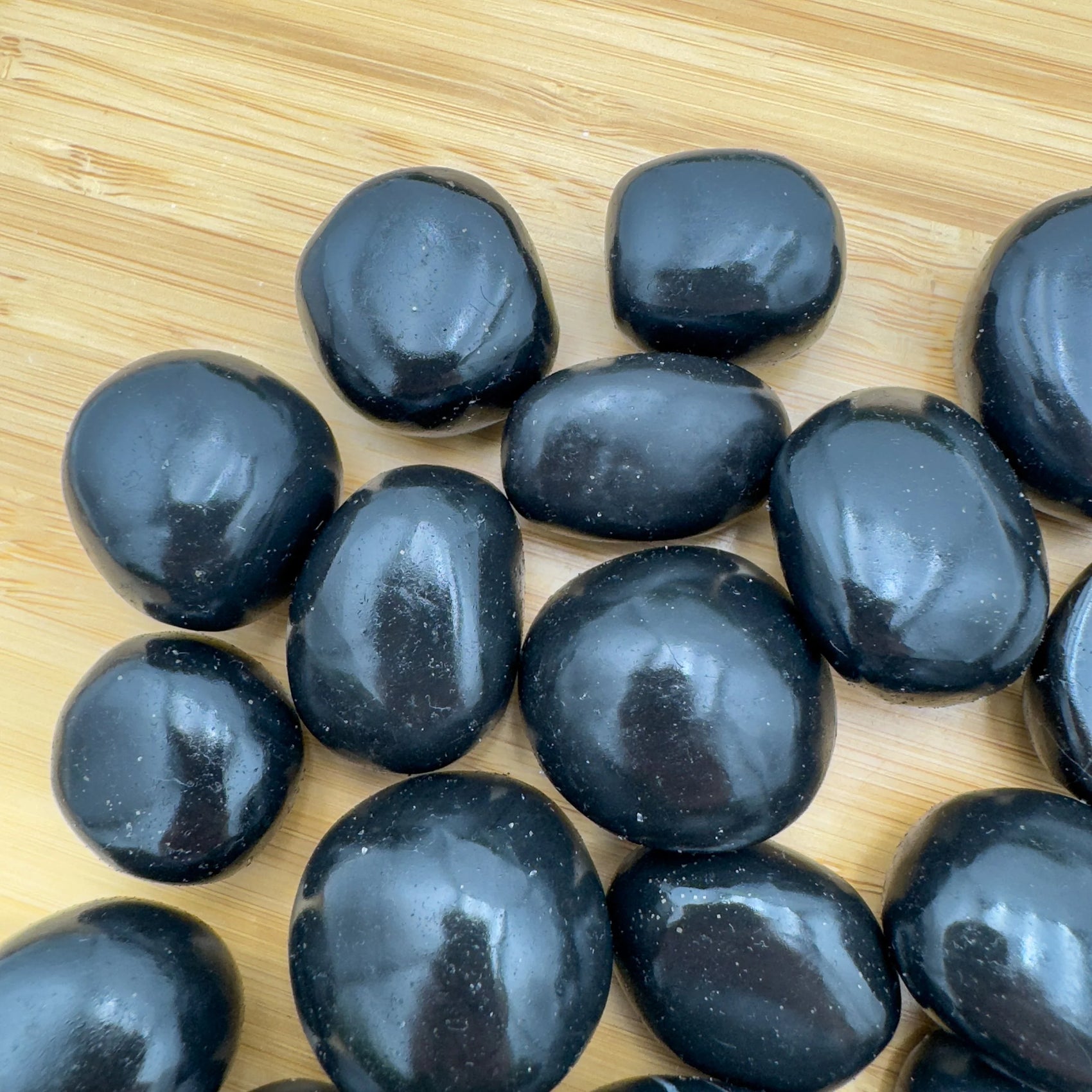 Full profile of Grade AA Black Onyx tumbled stone ready to ship from Beyond Bohemian