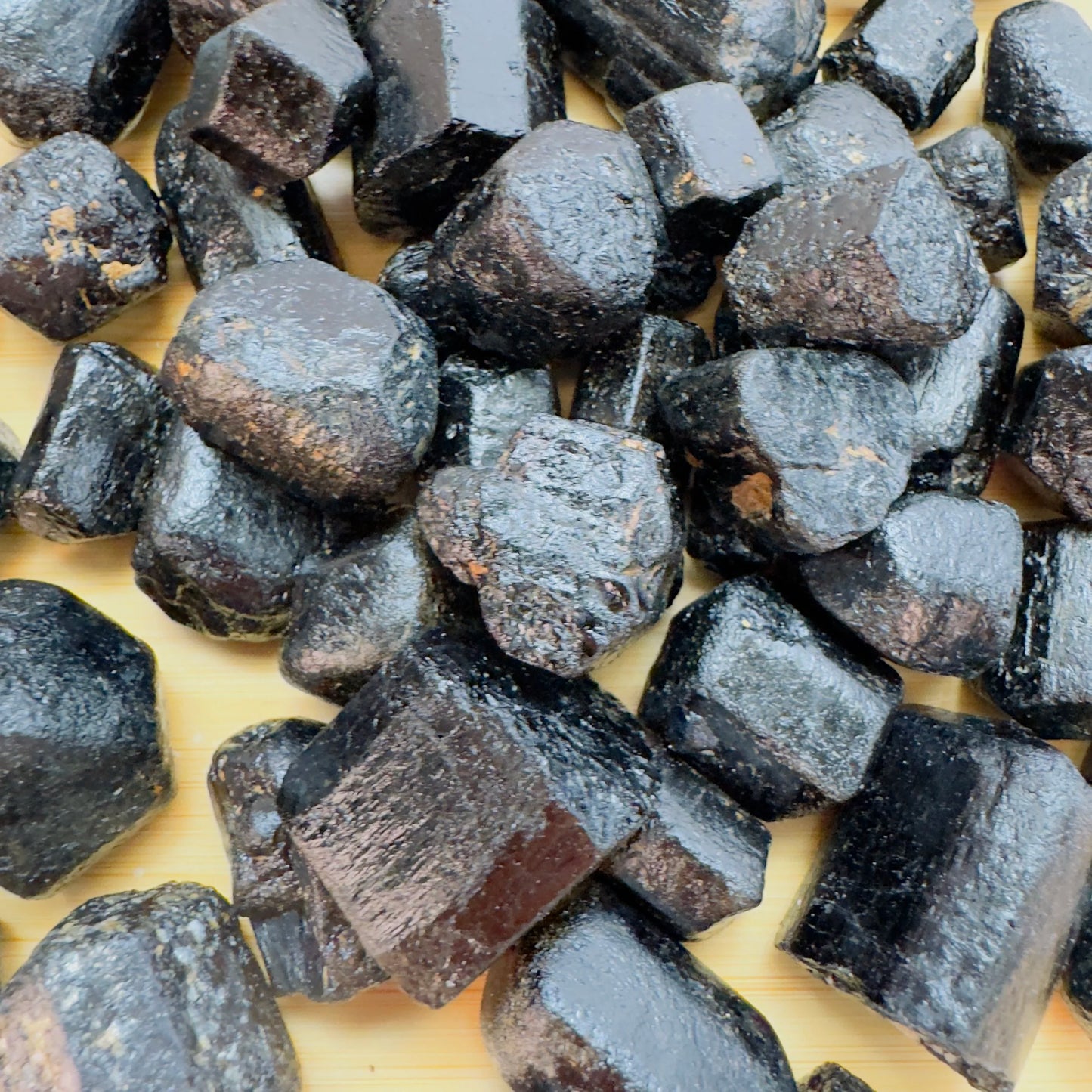 Reverse side of Black Tourmaline raw stone, showing natural patina.