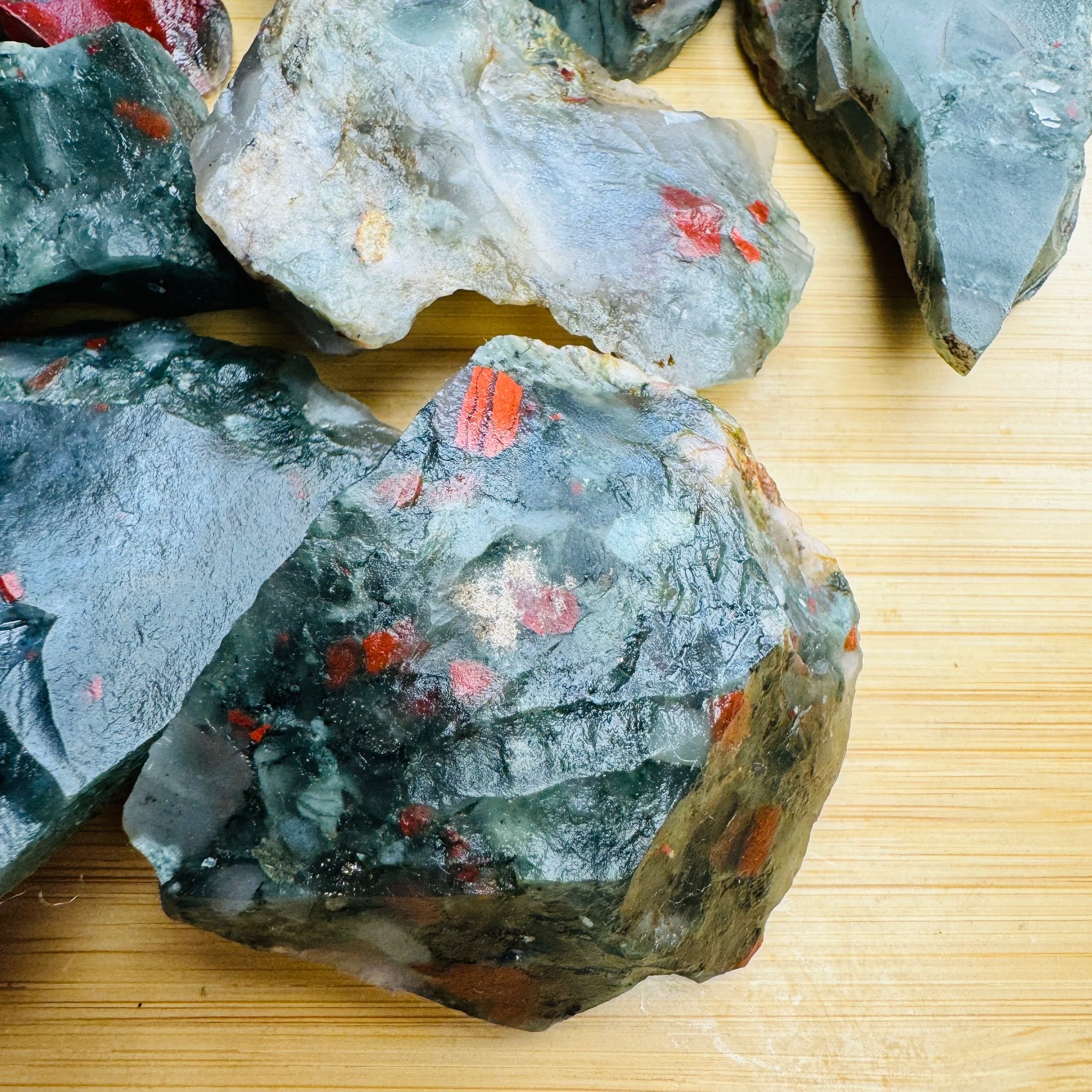 Handheld Bloodstone raw stone for meditation, Confidence and Protection