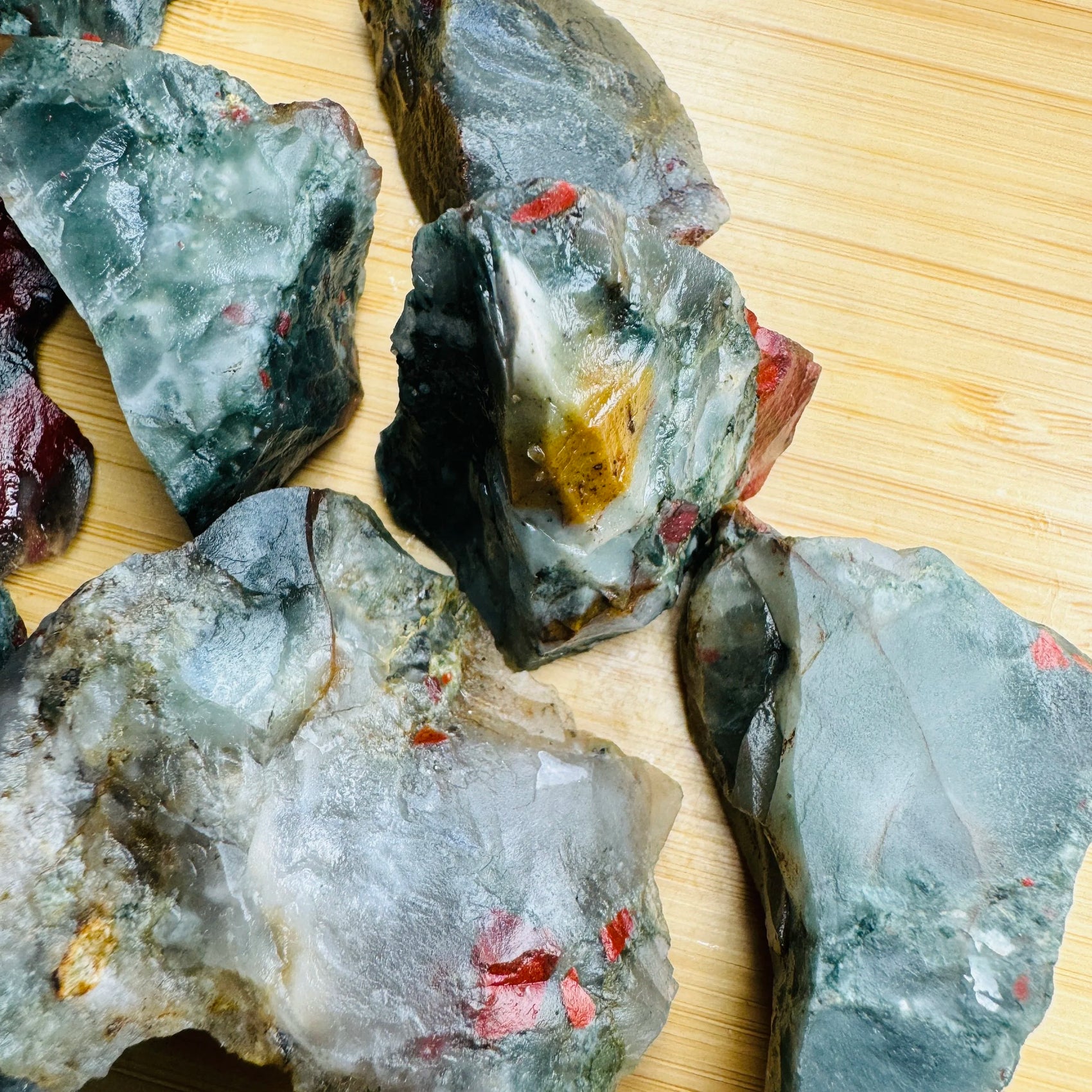 Close-up of Bloodstone raw stone, soothing wellness stone for Confidence
