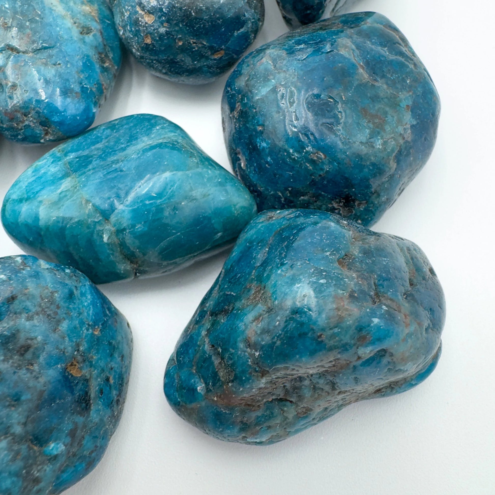 Top view of Apatite tumbled stone, from Madagascar, showing natural variation.