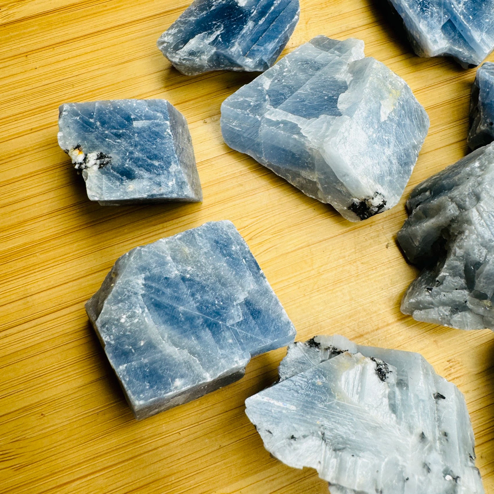 Top-side view of Blue Calcite raw stone, showing raw matrix.