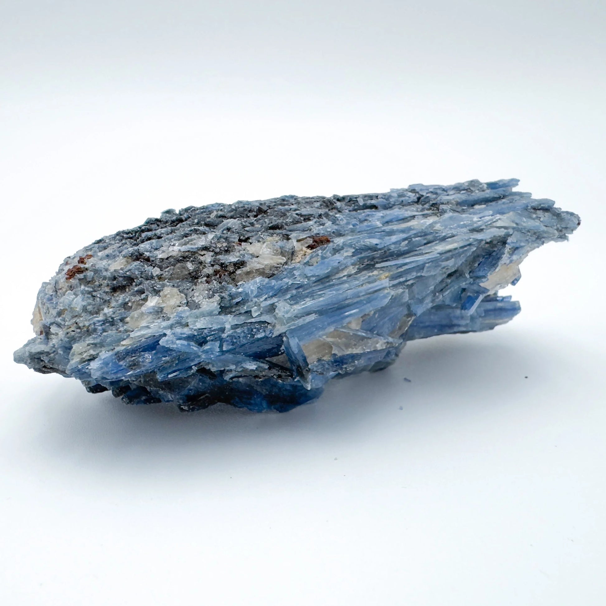 Side-on view of Blue Kyanite specimen, often worked with for Confidence, Brazil-sourced.