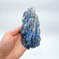 Studio-style view of Blue Kyanite specimen, set to give a sense of weight.