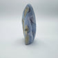 Aerial view of Blue Lace Agate raw geode, showing subtle veining.