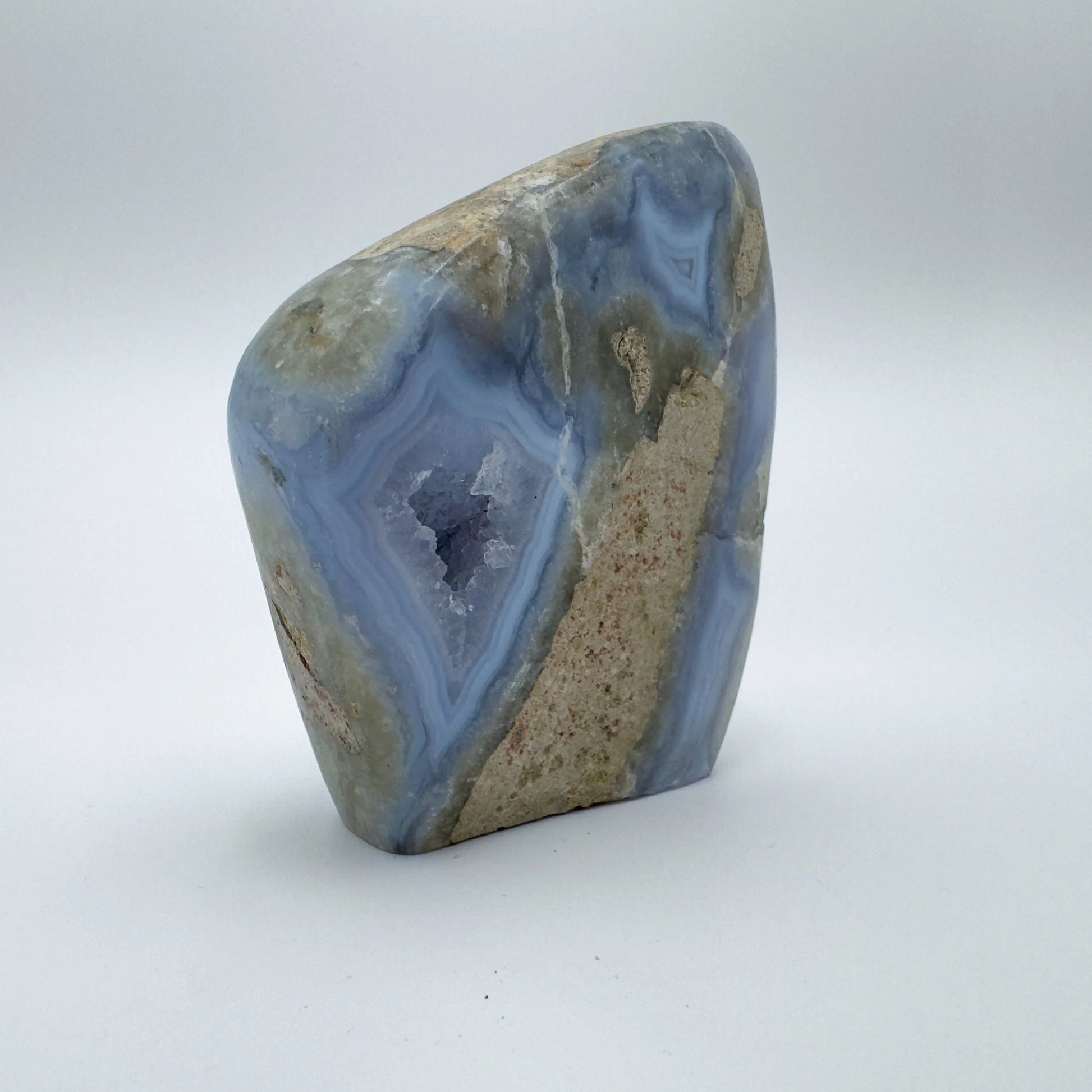Natural light view of a single Blue Lace Agate raw geode sourced from Malawi.