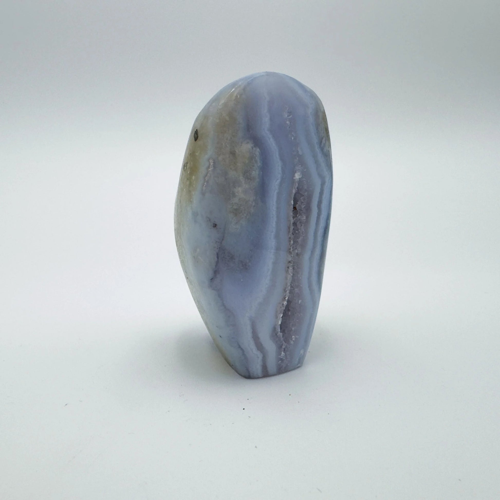 Profile view of Grade AA Blue Lace Agate raw geode, showing natural form, Malawi-sourced.