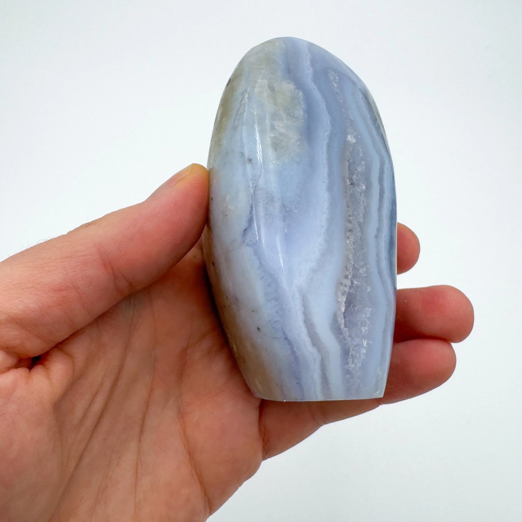 Back view of Grade AA Blue Lace Agate geode showing natural surface