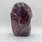 Texture-level view of Blue Rose Quartz freeform, showing glassy finish, often kept for Stress Relief and Emotional Healing.