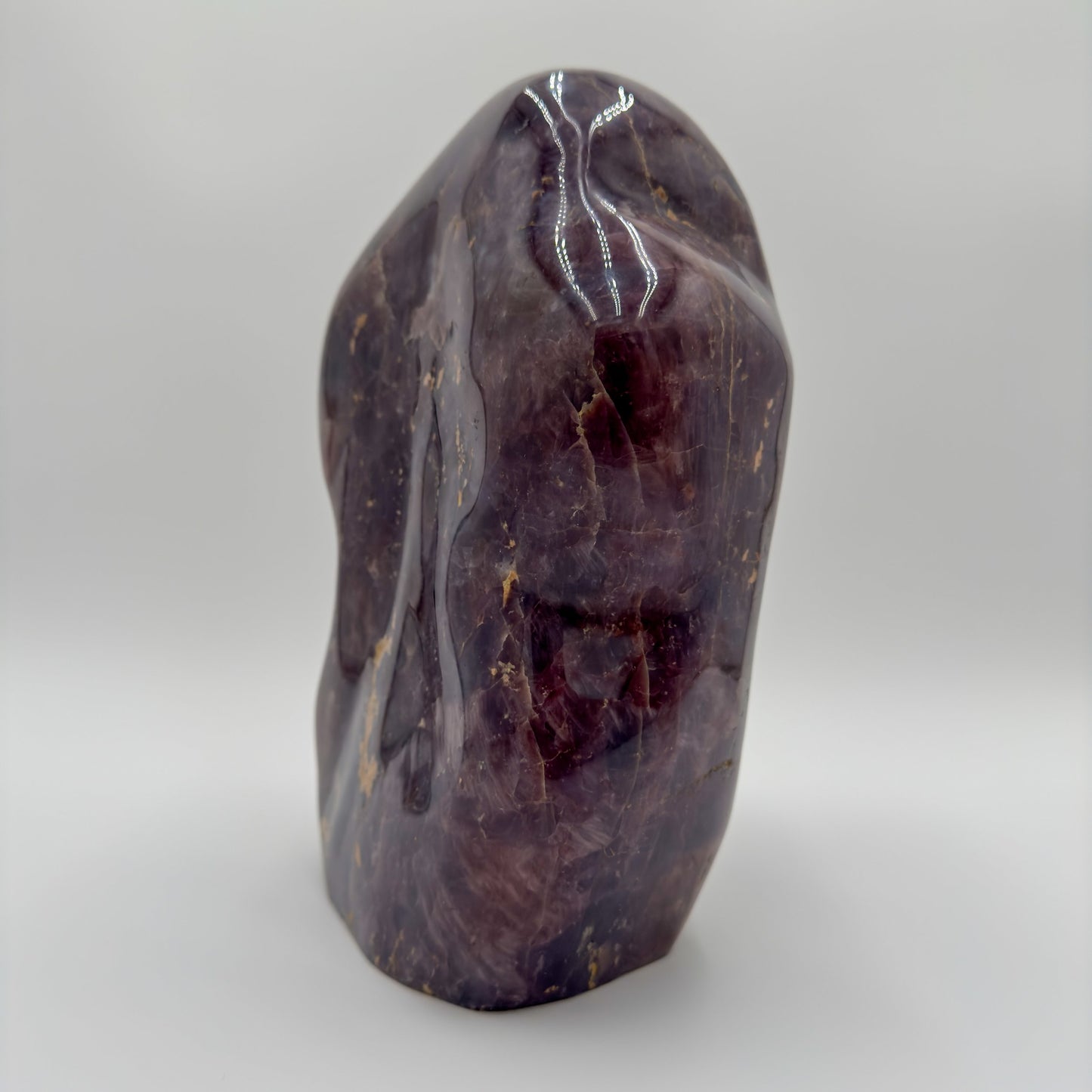 Rear view of Blue Rose Quartz freeform, from Madagascar, showing characteristic color.
