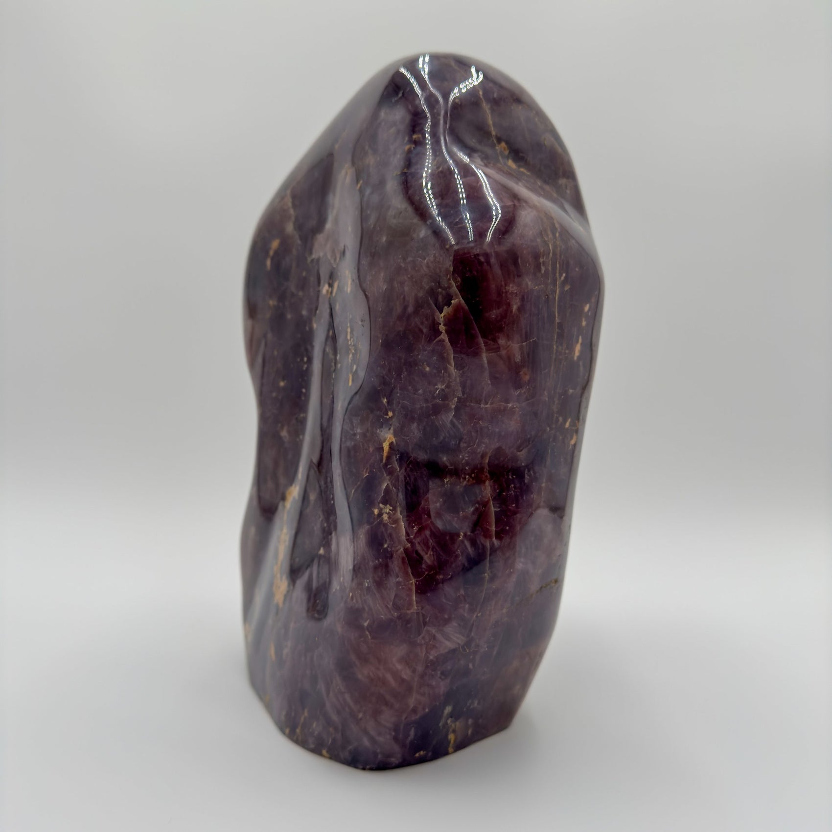 Rear view of Blue Rose Quartz freeform, from Madagascar, showing characteristic color.