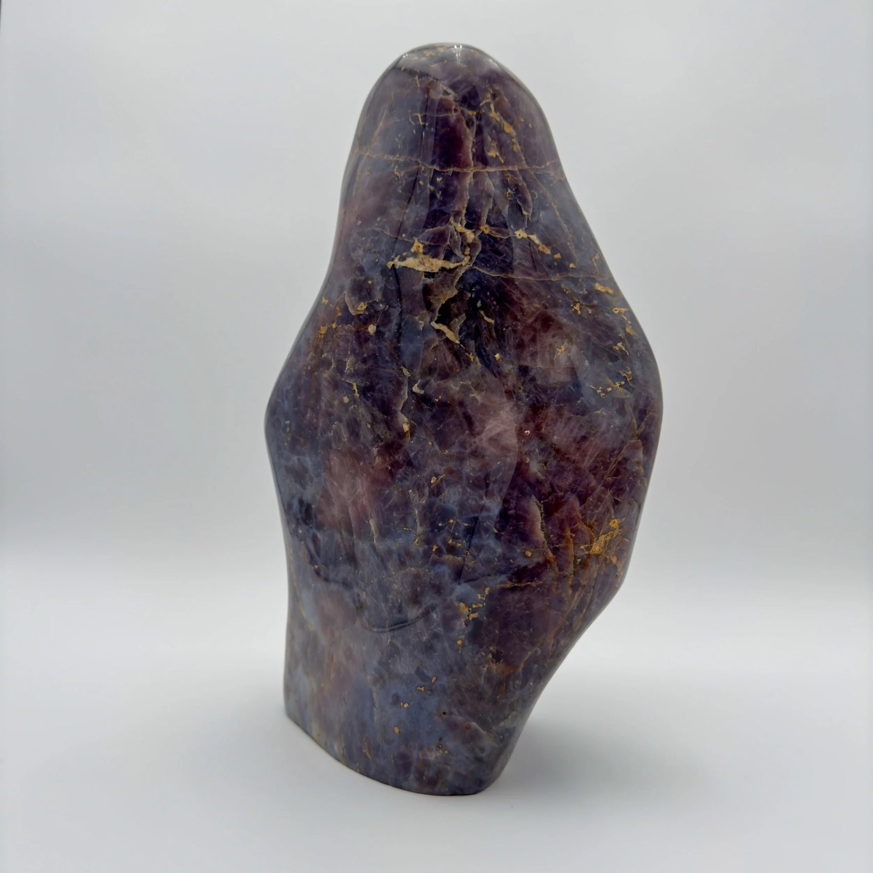 Bottom side of Blue Rose Quartz freeform, showing natural texture, from Madagascar.