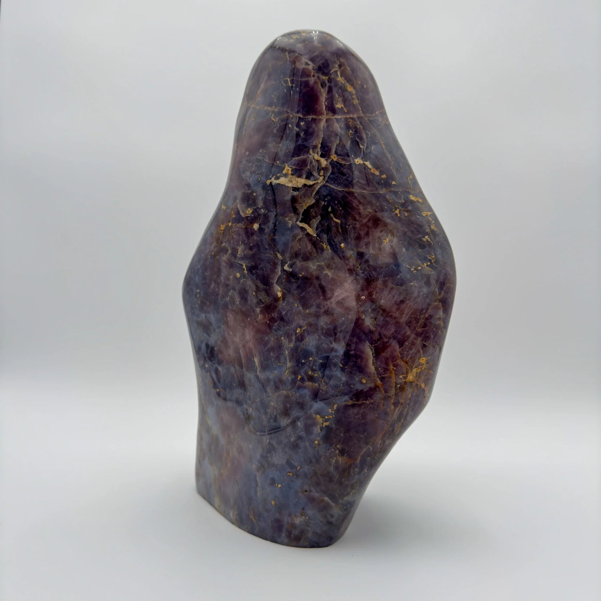 Bottom side of Blue Rose Quartz freeform, showing natural texture, from Madagascar.