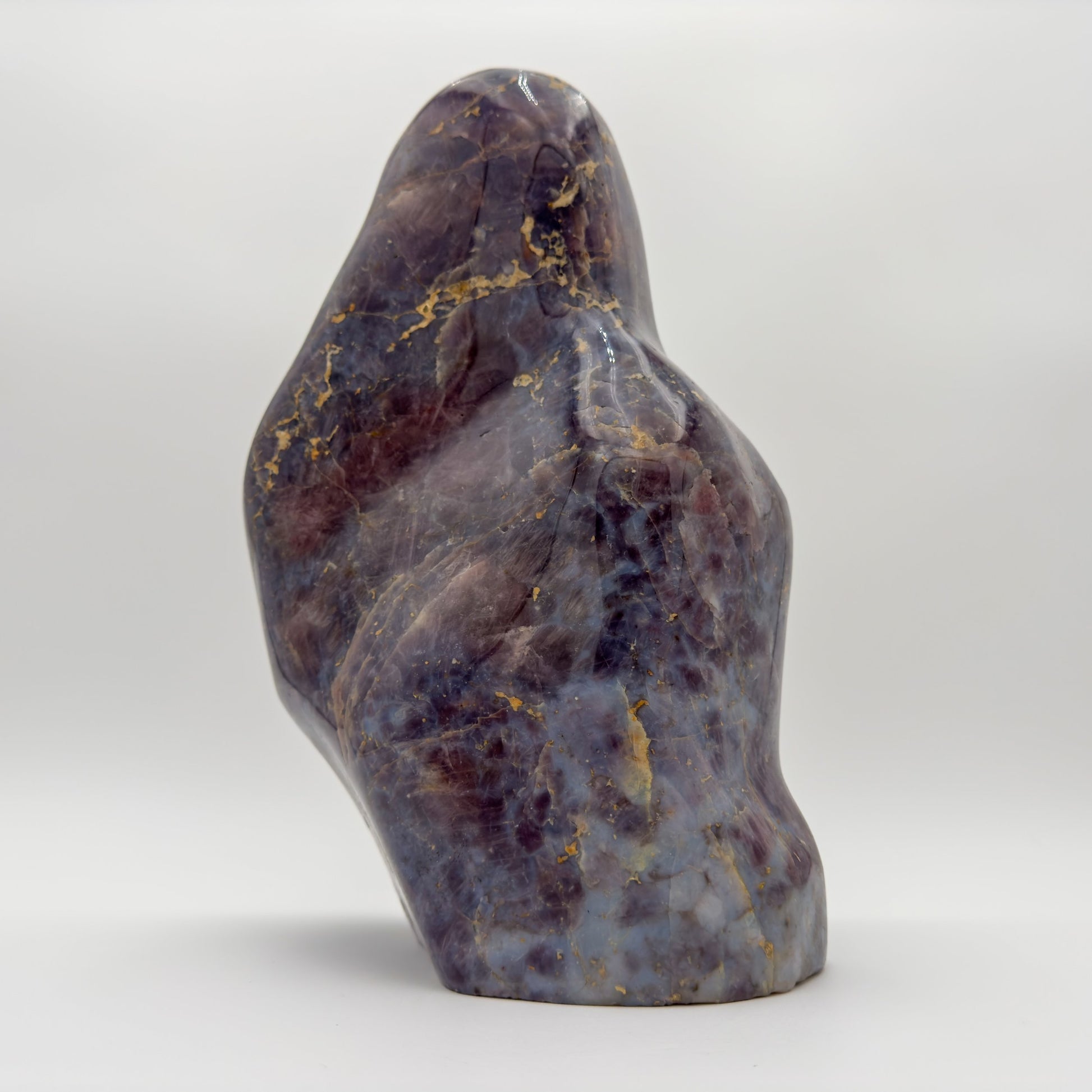 Open-palm view of Blue Rose Quartz stone, traditionally used for Confidence, shown at hand scale.