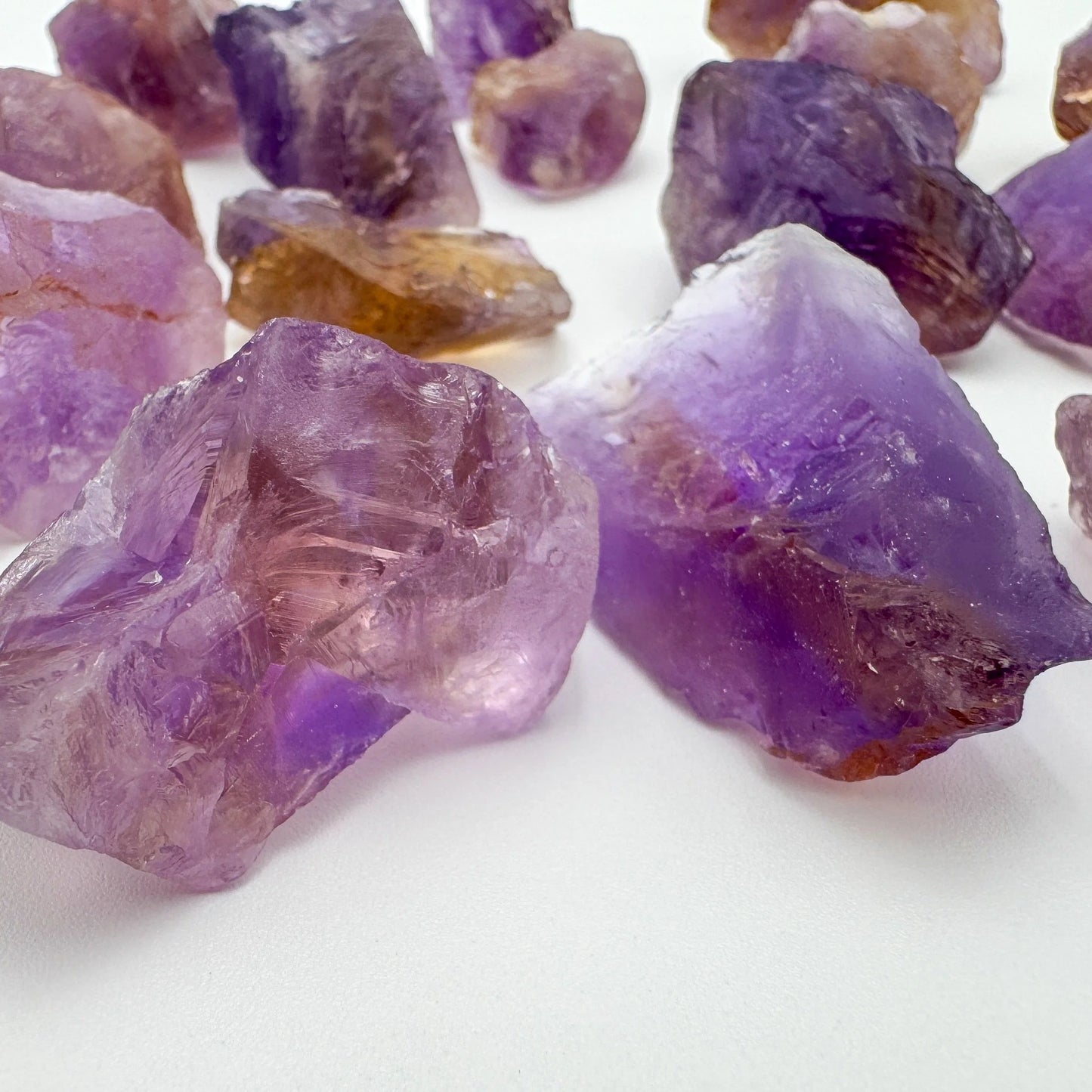 Alternate angle of Grade AA Ametrine raw showing overall shape