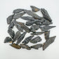 Texture-level view of Black Kyanite raw stone, showing open form, from Brazil.