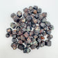 Close detail of Grade AA Fuchsite raw stone, worked with for Healing, showing raw matrix.