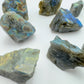 Bottom side of Labradorite raw stone, from Atsimo-Andrefana, Madagascar, associated with Intuition.